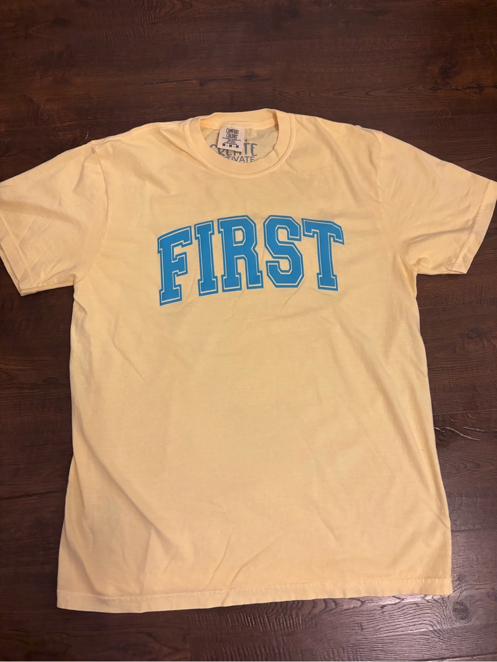Comfort Colors Yellow Tee with Blue "FIRST" Graphic